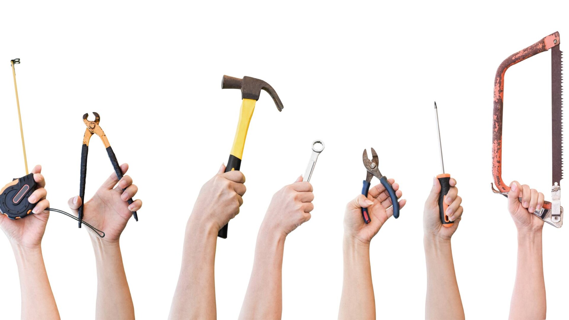 Nine hands holding up different types of tools, including a screwdriver, hammer, tape measure, and others.